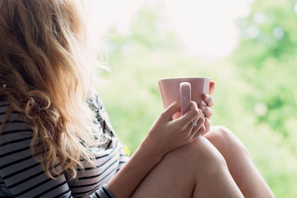woman with mug,self care when overwhelmed